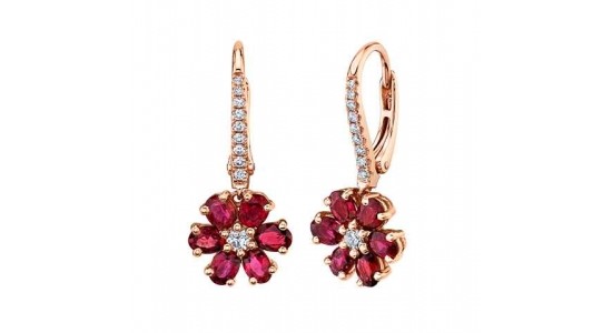 a pair of rose gold drop earrings featuring ruby flowers
