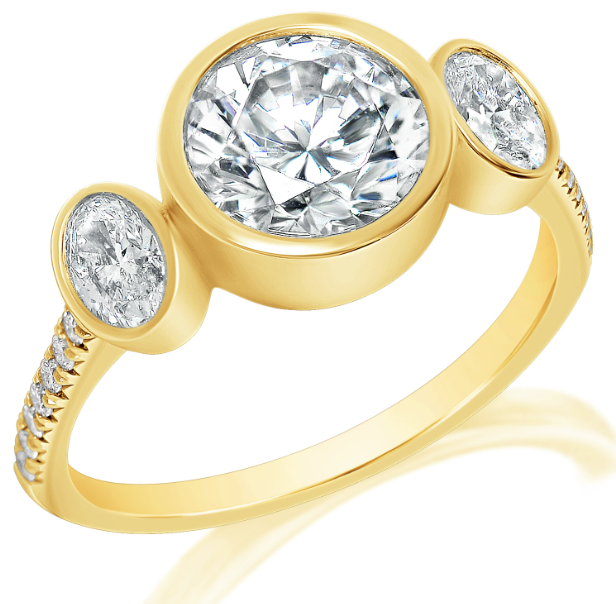 A yellow gold three stone diamond bezel set engagement ring.