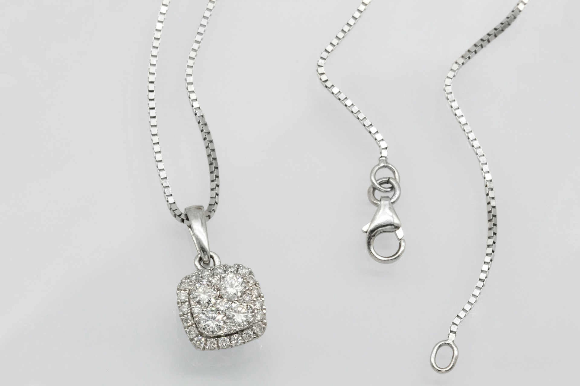 a platinum and diamond chain pendant